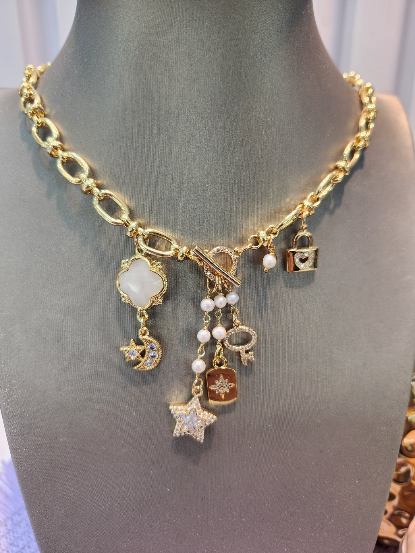 Collar broche T zirconia multidijes estrella