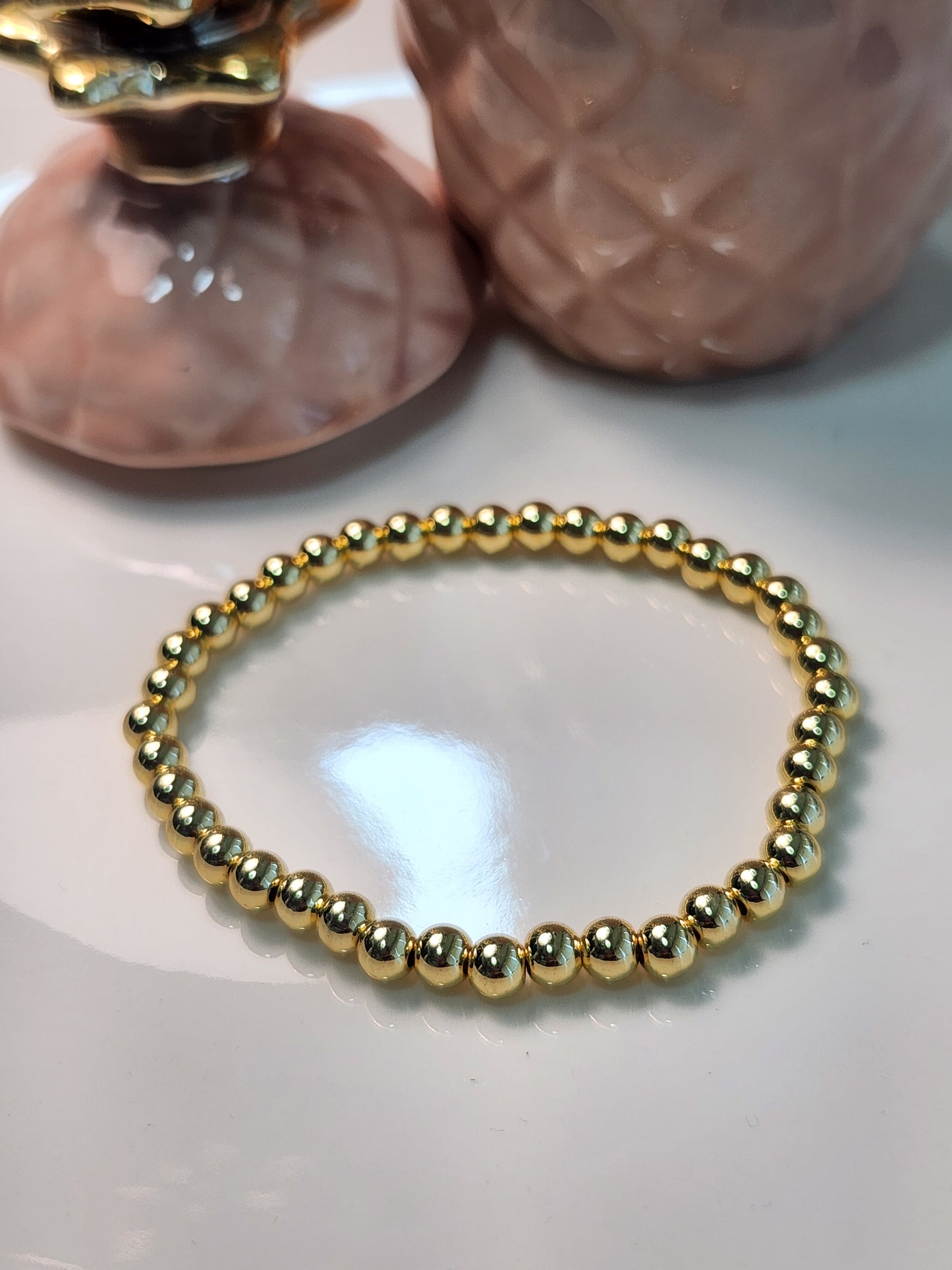 Pulsera mediana resorte bolas lisas