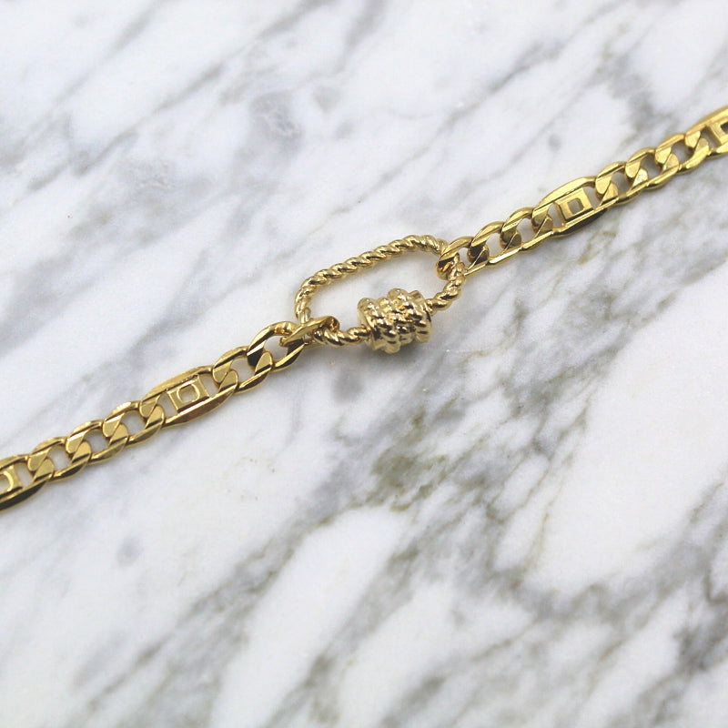 PULSO BROCHE TORCIDO, BARBADA GUC EN CHAPA DE ORO 14K