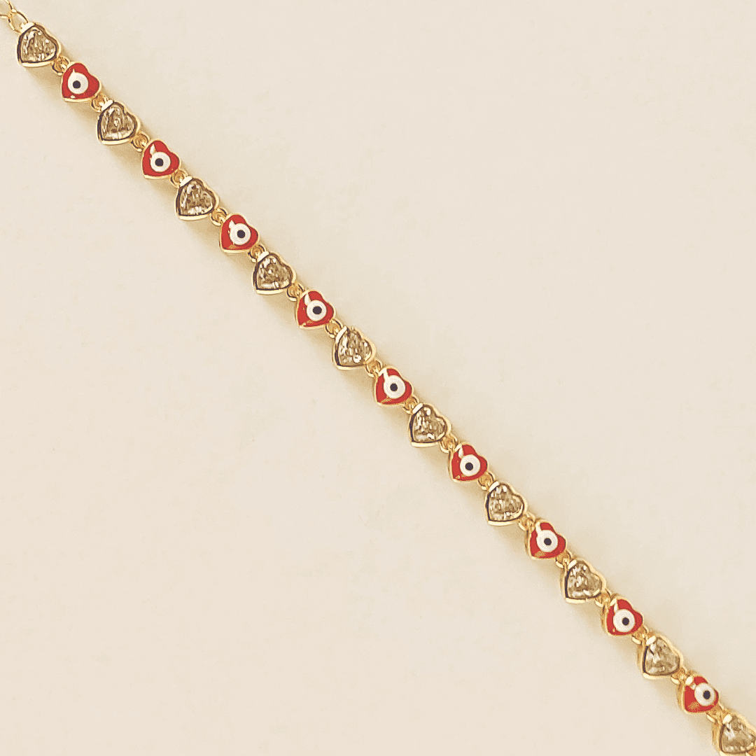 Pulsera de eslabones y ojo turco y corazones de color rojo