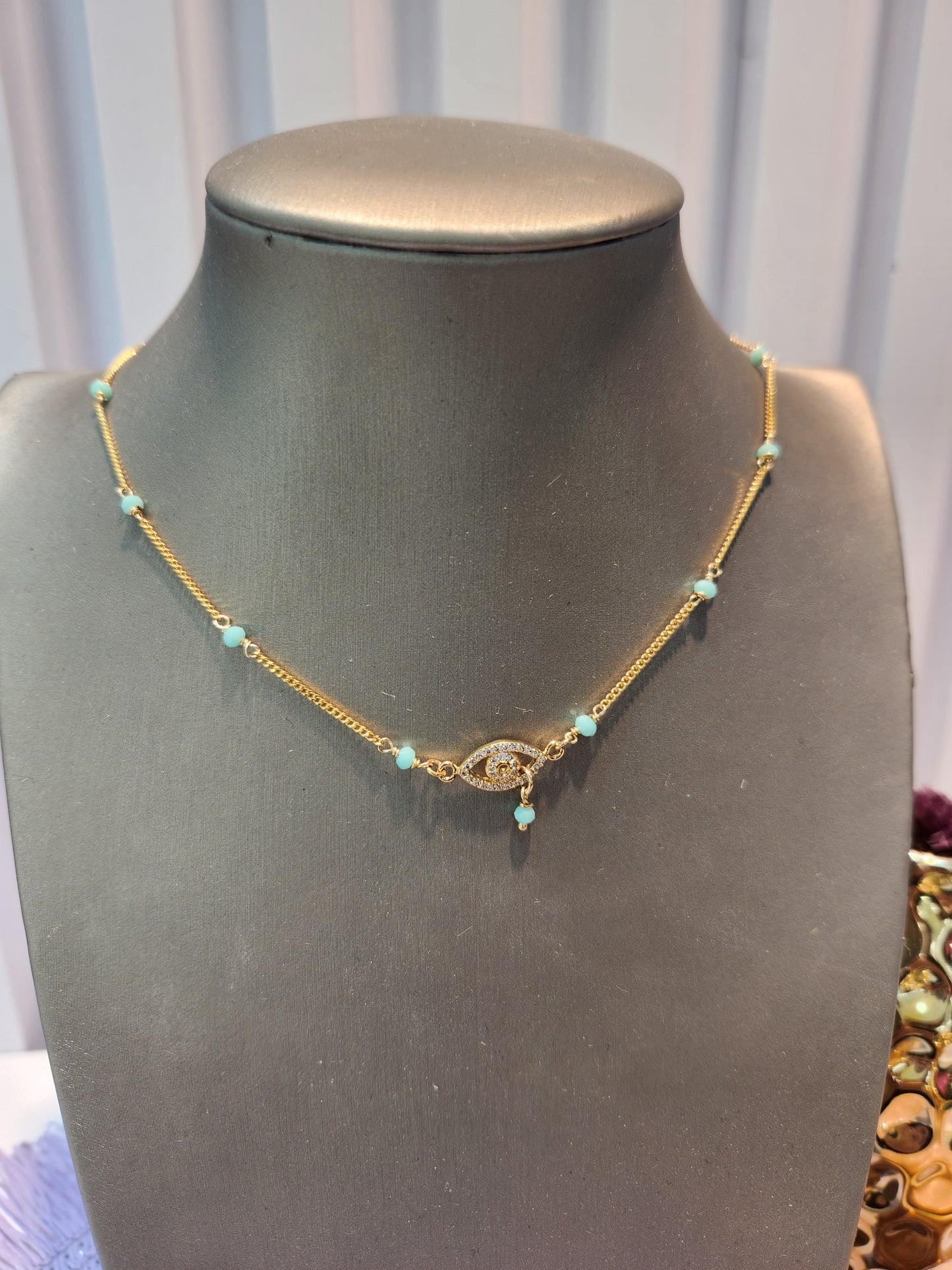 Choker ojo mini piedra azul.