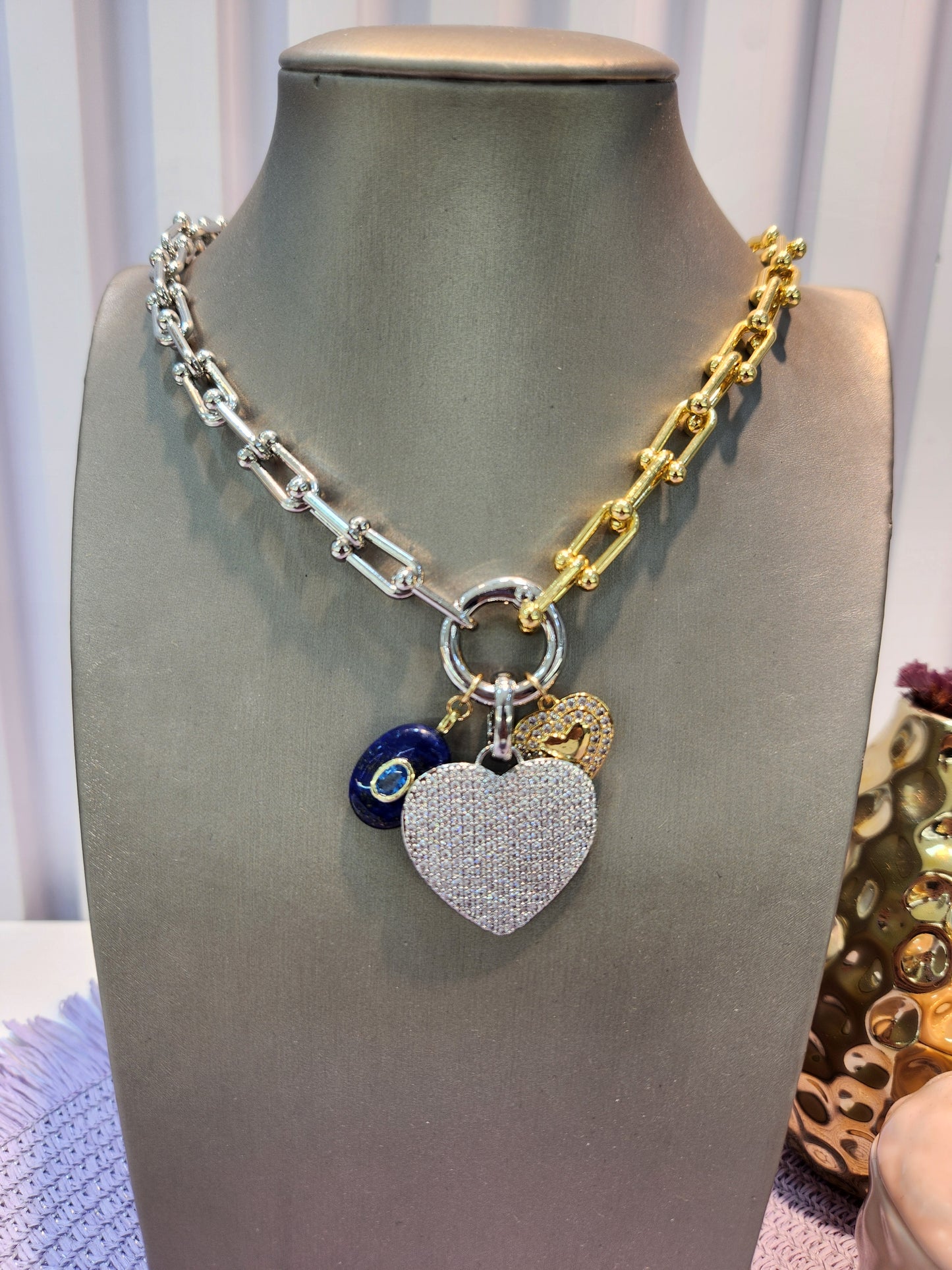 Collar eslabones bicolor corazon zirconia.