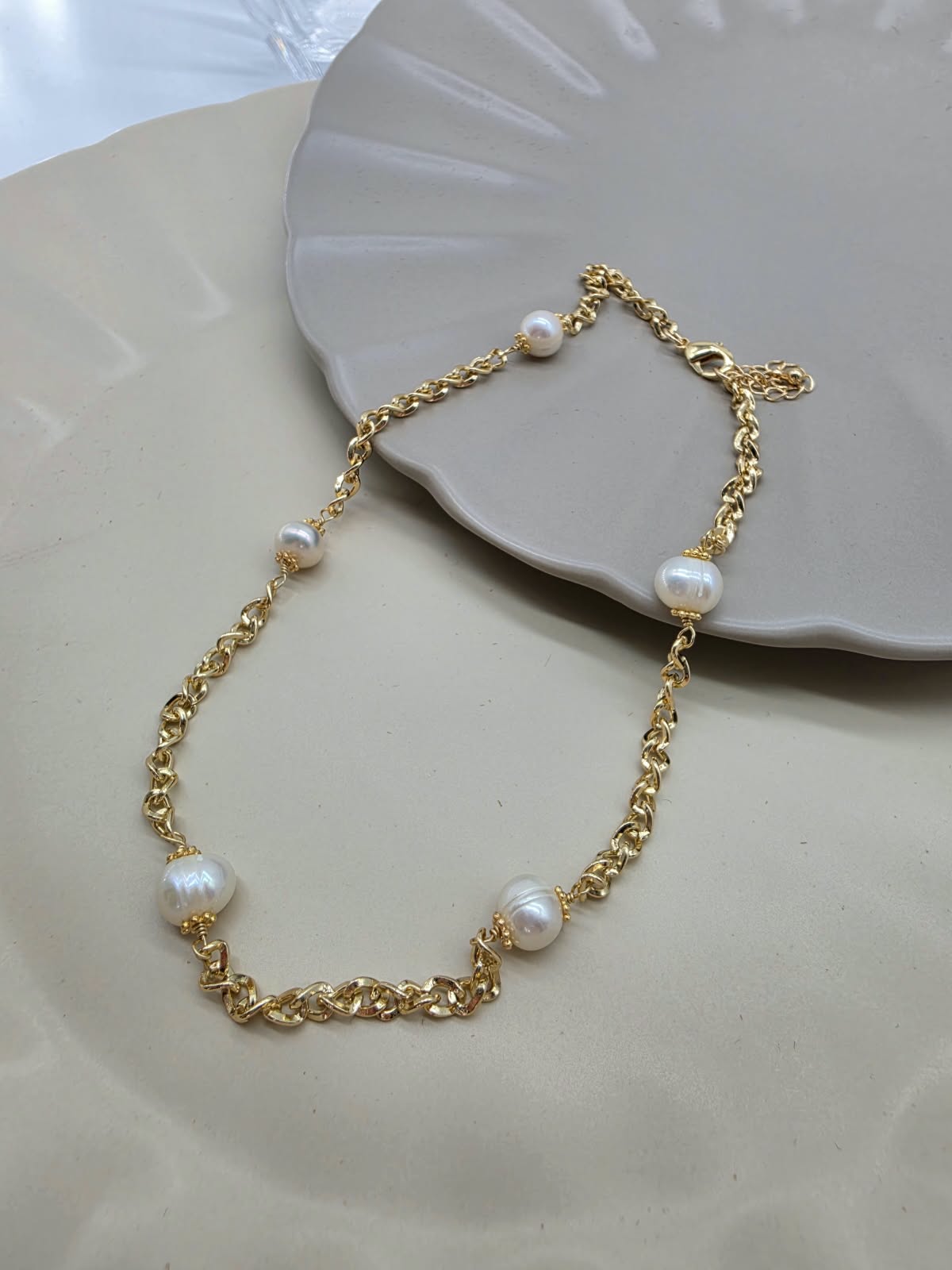 Choker perlas.