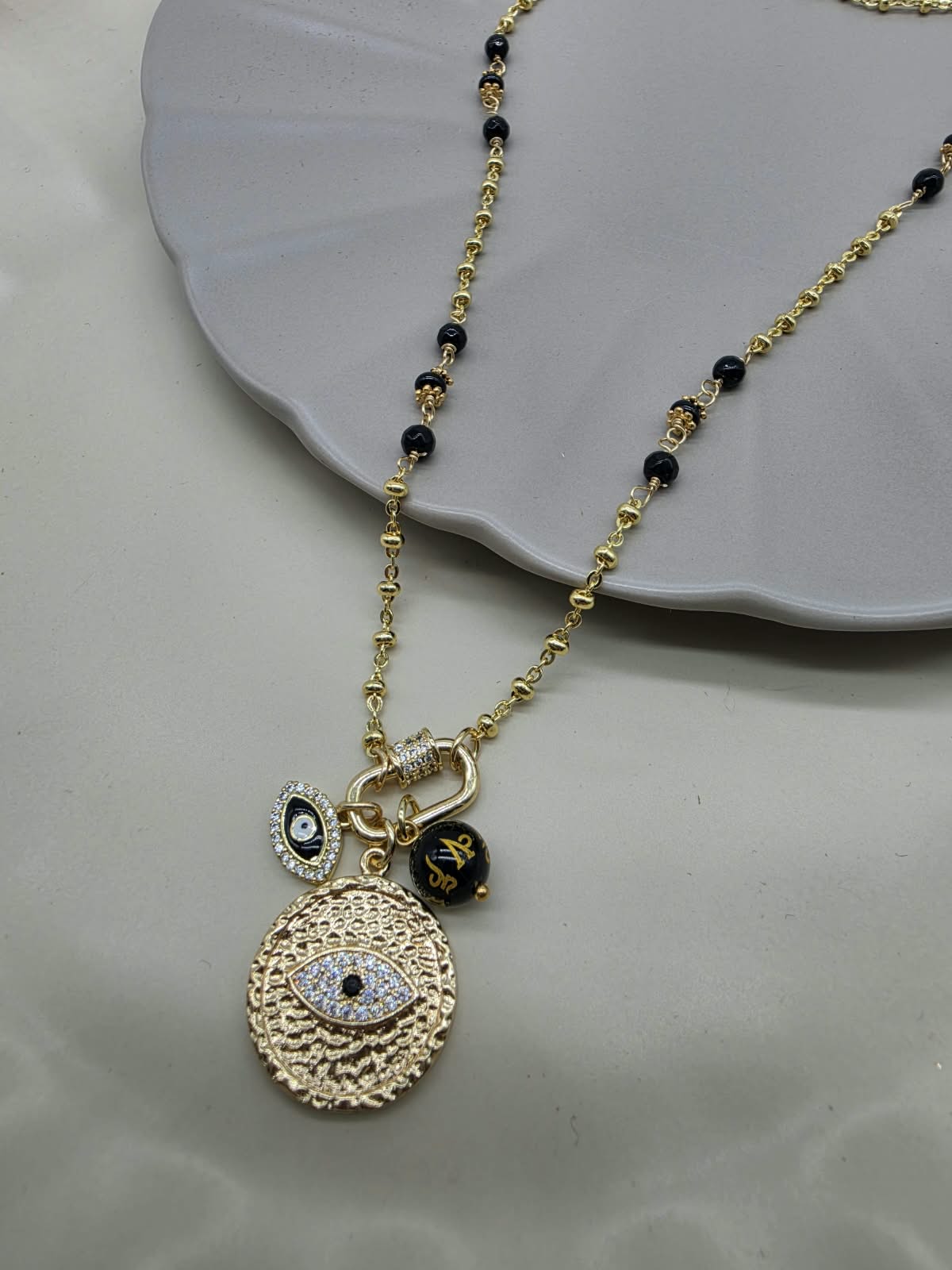 COLLAR LARGO ONIX OJO DIJES