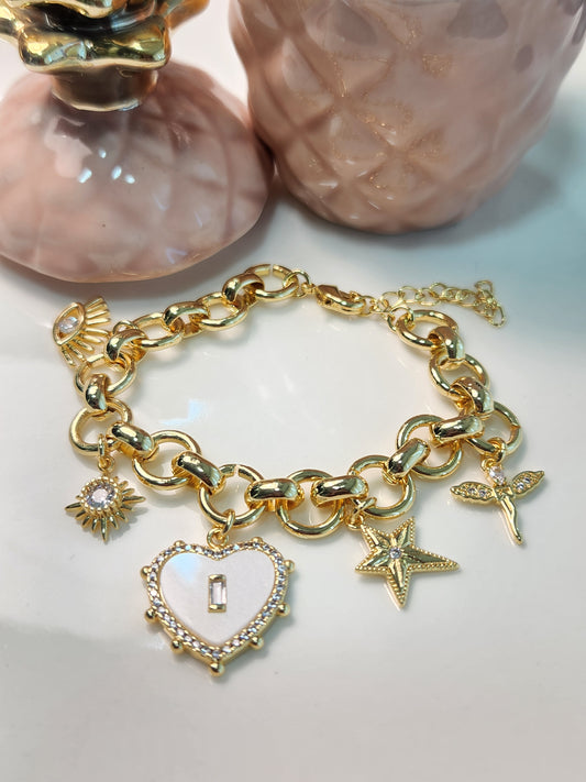 Pulsera argollas varios dijes corazon blanco
