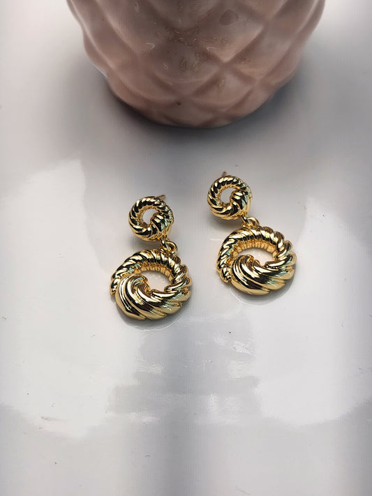 Arete doble circulo trenzado