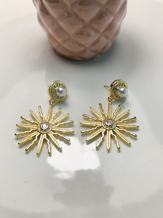 Arete sol rayas zirconia y perla