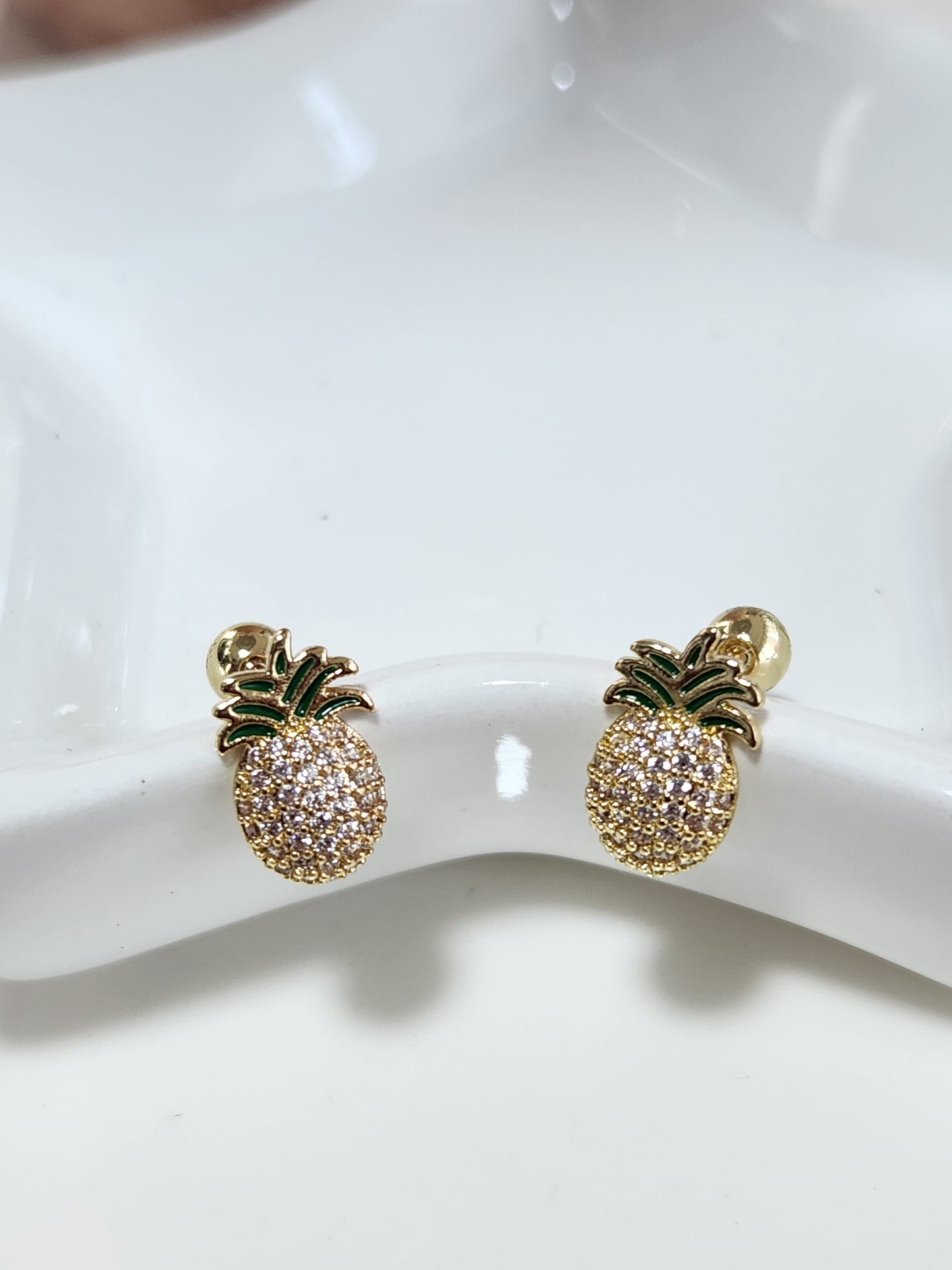 Broquel piña zirconia.