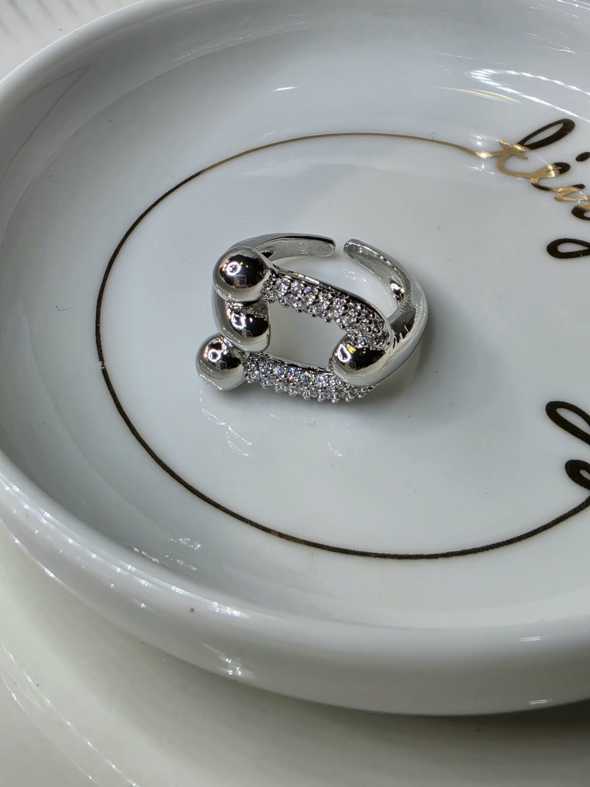 ANILLO RODIO HERRADURA ZIRCONIA