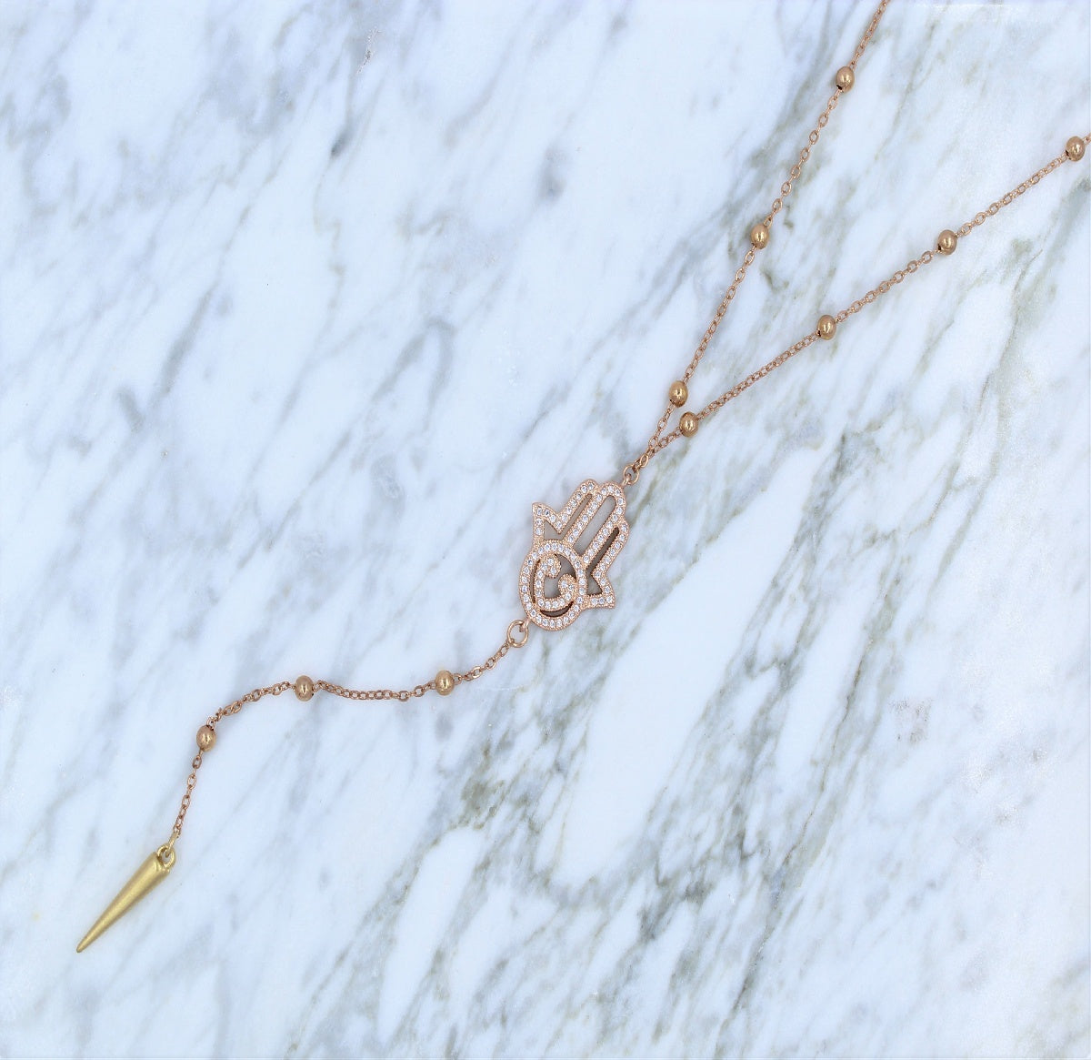 COLLAR EN V, MANO HAMSA CON ZIRCONIAS ROSE GOLD DE 14K