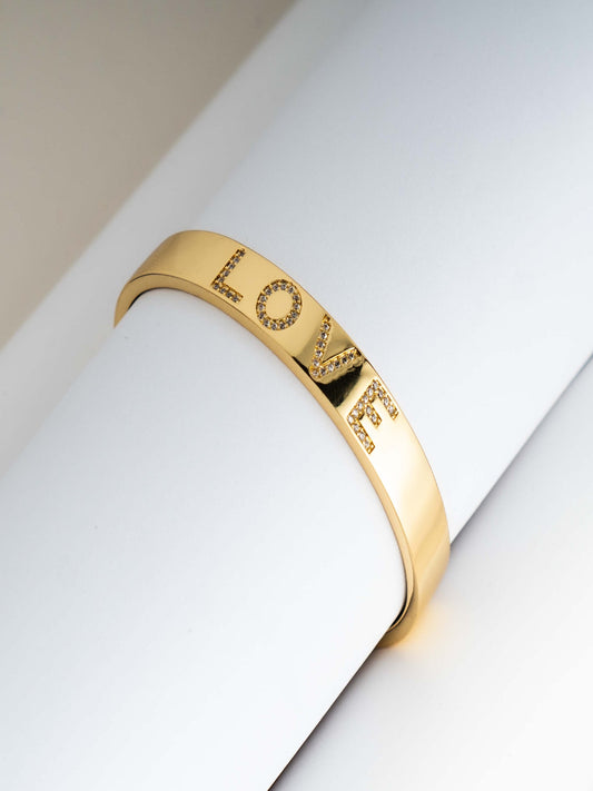 BRAZALETE LOVE ZIRCONIAS EN CHAPA DE ORO